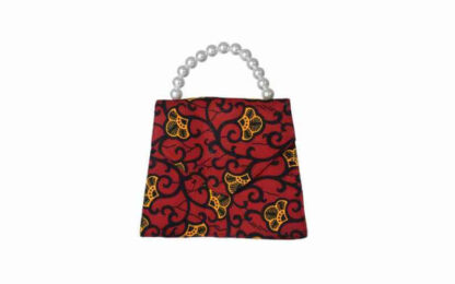 red, orange and black african wax print tote bag with faux pearl handle